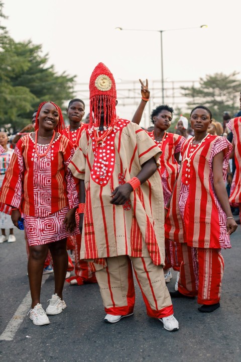 a group of people dressed in red and white