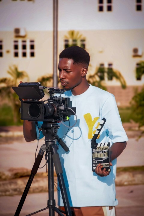 a man standing in front of a camera