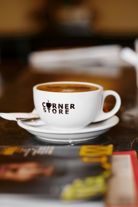 a cup of coffee on a saucer