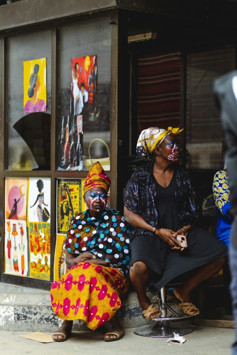 a couple of people wearing masks