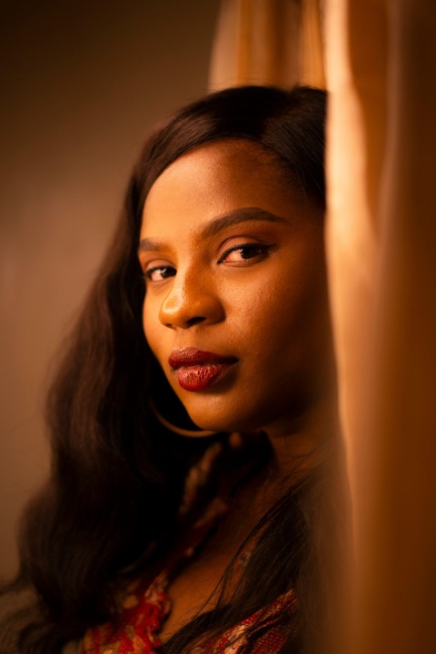 woman in black shirt with red lipstick