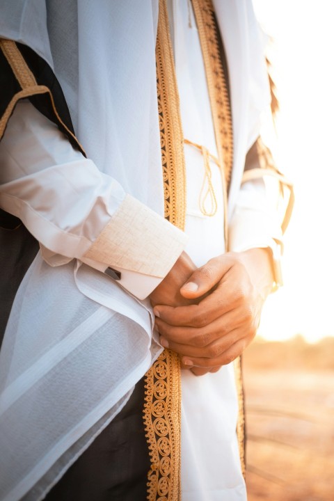 a close up of a person wearing a priests robe