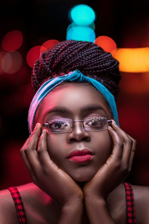 woman in blue knit cap and black framed eyeglasses qpqEdwxem