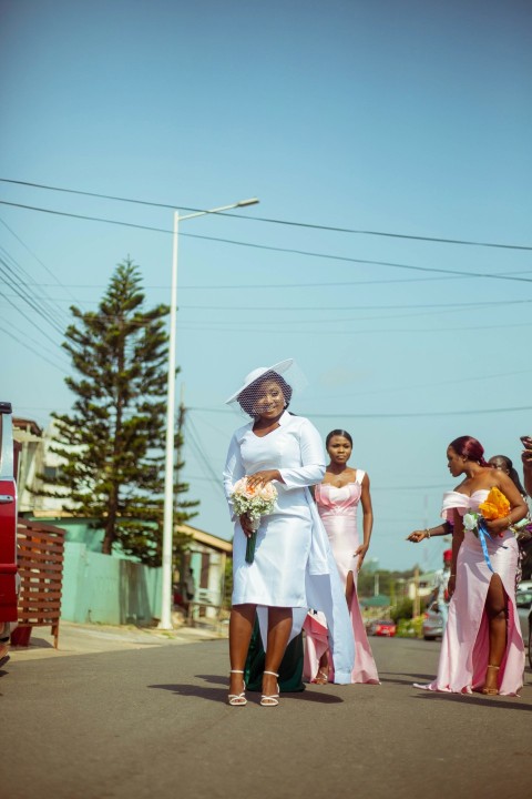 a woman in a white dress and a woman in a pink dress