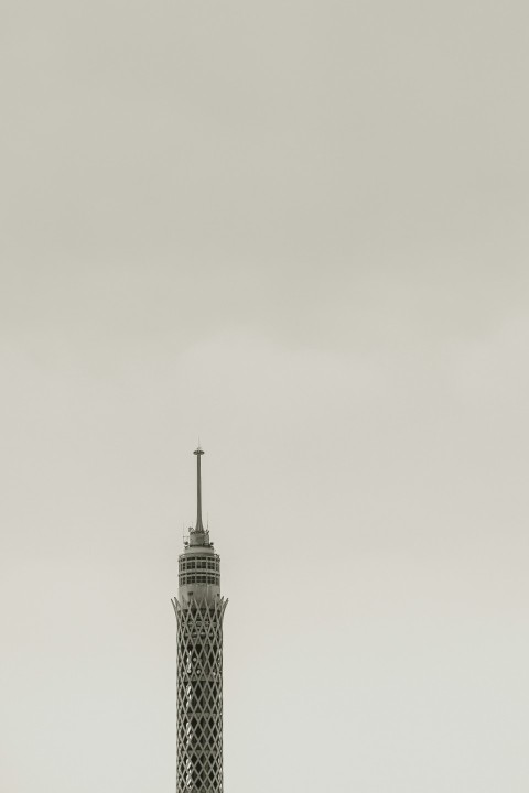 gray concrete tower under white sky during daytime 6