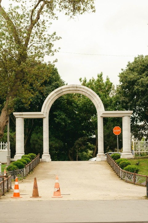 a gate with a stop sign in the middle of it qqWPFJ2GC