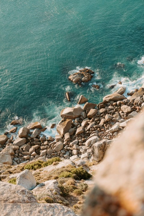 a view of the ocean from the top of a hill u