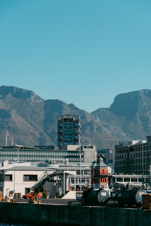 a city with mountains in the background