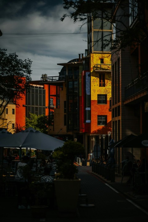 a city street filled with lots of tall buildings