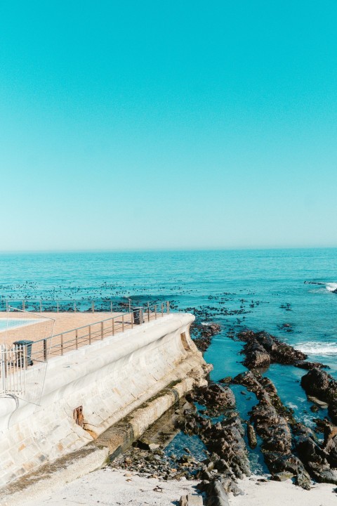 a view of a beach with a boat in the water