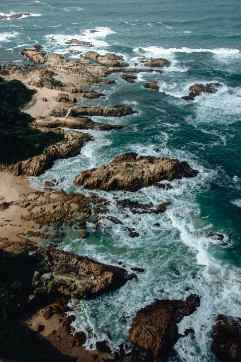 brown stones and body of water