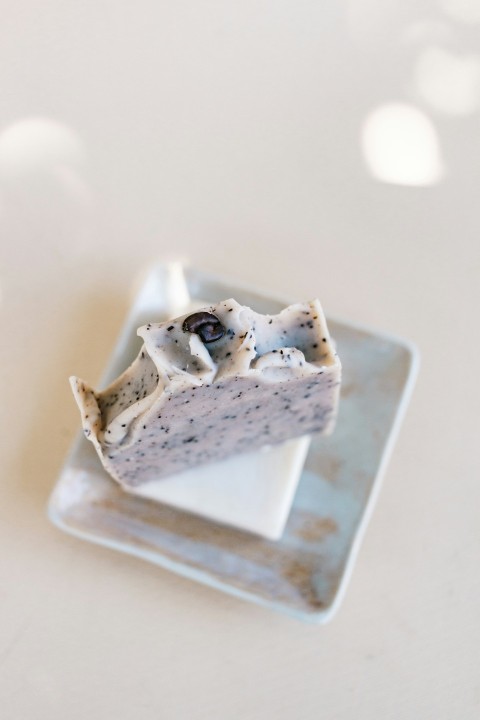 white and brown cake on white ceramic tray