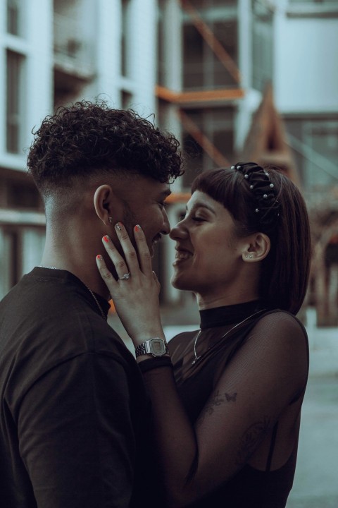 a man and a woman standing next to each other