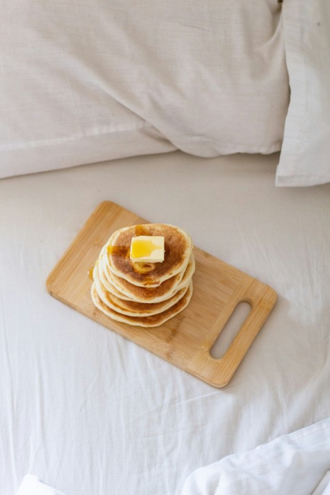 brown bread on brown wooden chopping board