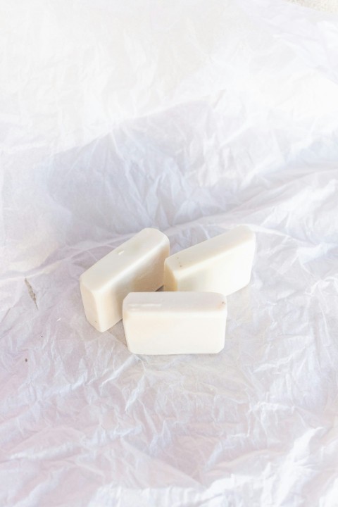 white soap bar on white textile rtfxqOvI2