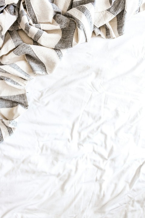 white and brown textile on white textile wysJ3I7