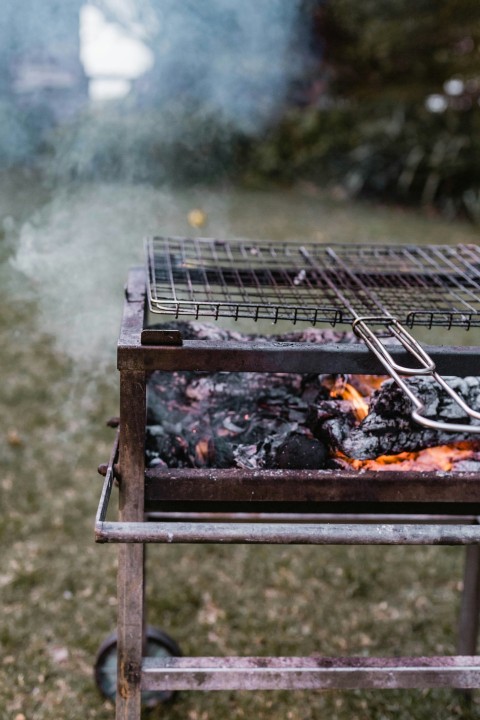 brown wooden fire pit with fire