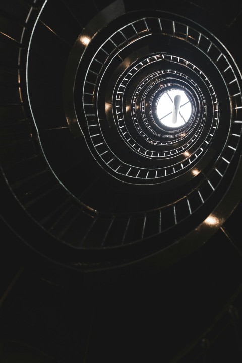 low angle photography of spiral staircase