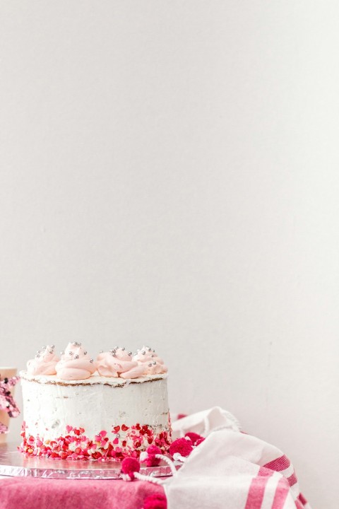 white and brown cake on white table