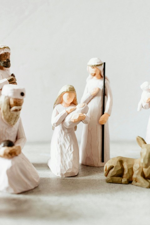 a group of figurines of people and animals