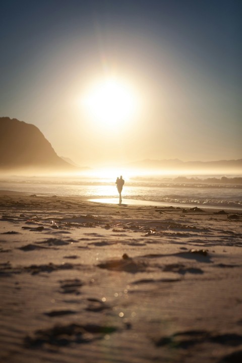 a person standing on a beach