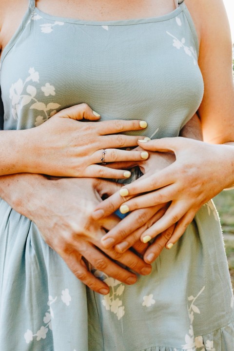 woman in white floral dress with silver ring