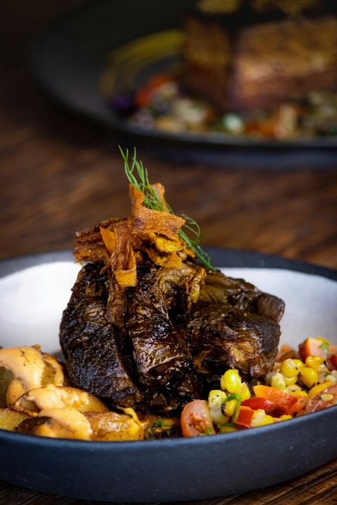 a close up of a plate of food on a table