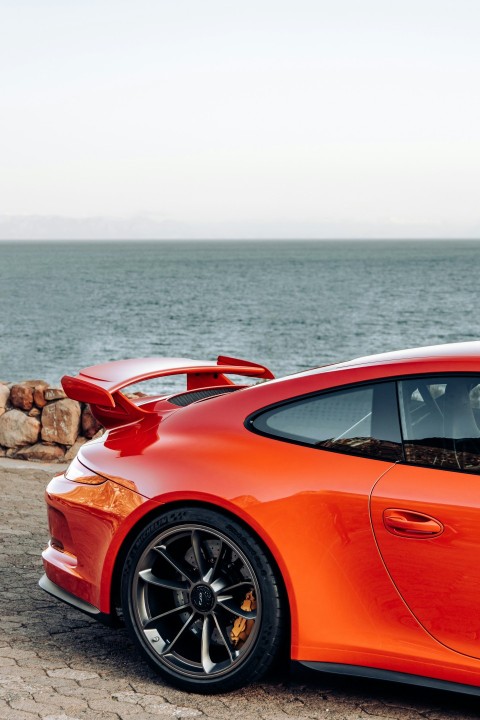 a car parked by the water