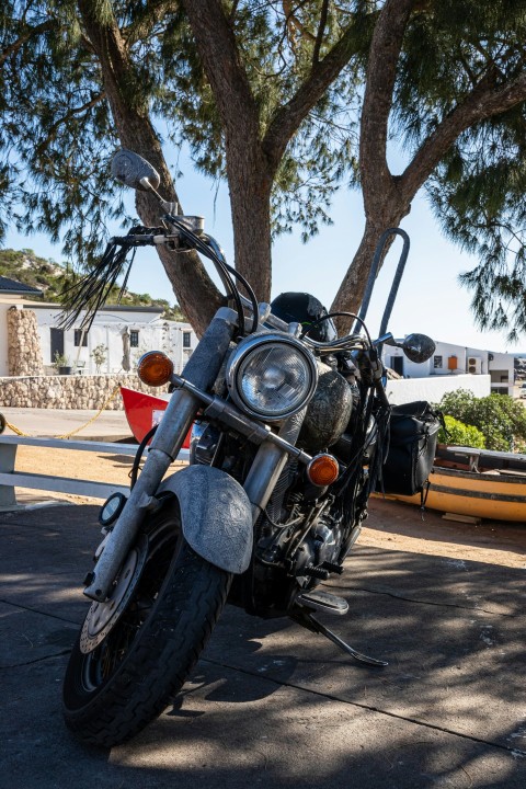 a motorcycle parked on the side of the road