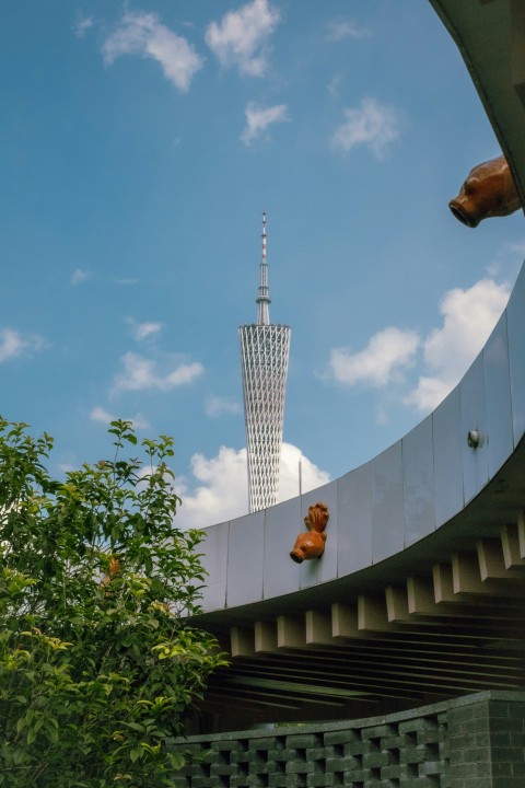 a view of a very tall building from below