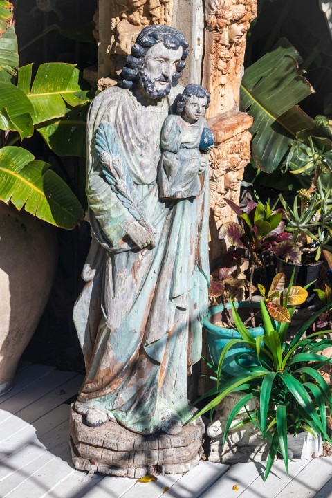 a statue of a person holding a child