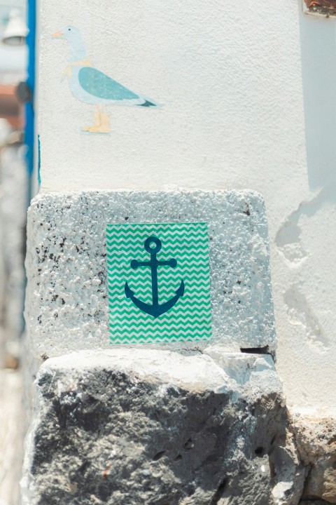 a sticker of an anchor on the side of a building