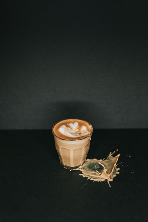 white ceramic mug with brown liquid Y4mGhzFRU