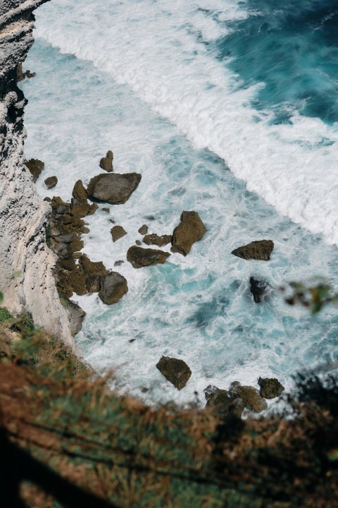 a view of the ocean from the top of a cliff