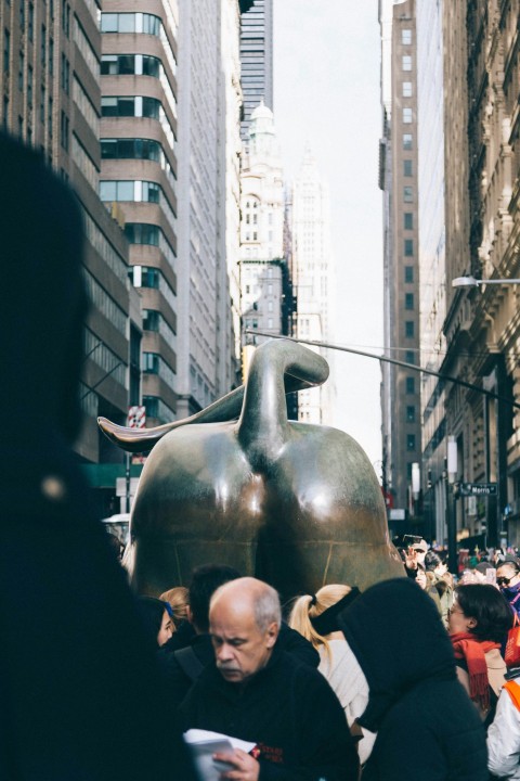 man in black near statue