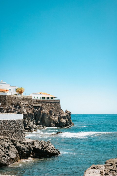 a body of water with buildings along it