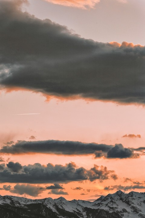 high angle photography of clouds and mountains