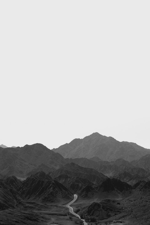 black and white mountains under white sky IkkMQi