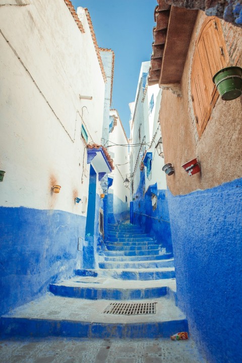 blue and white concrete hallway stairs