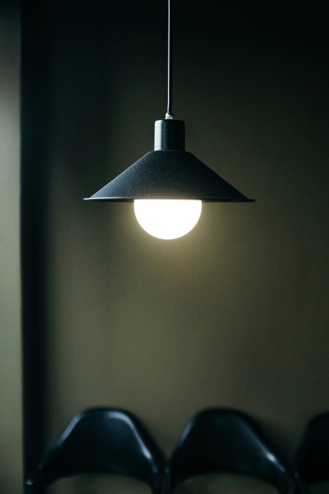 black pendant lamp turned on in room  yLHx_Qm