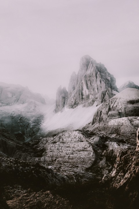 grayscale photography of rock formation