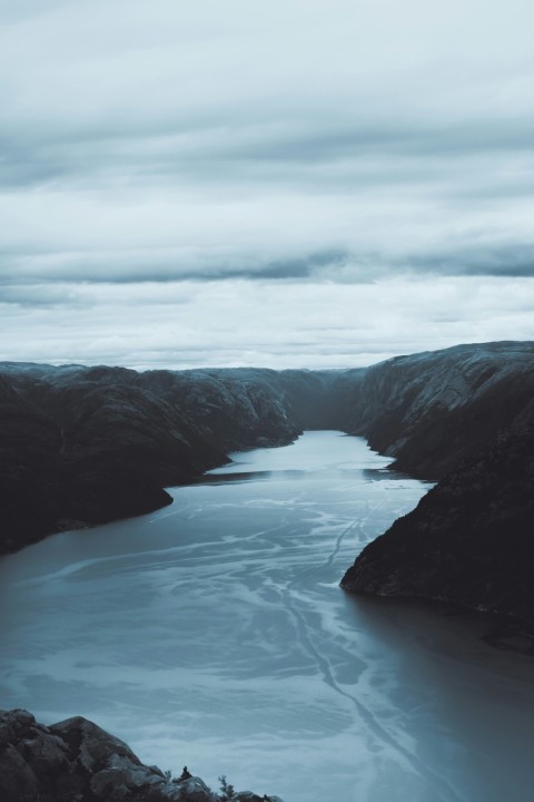 a large body of water surrounded by mountains