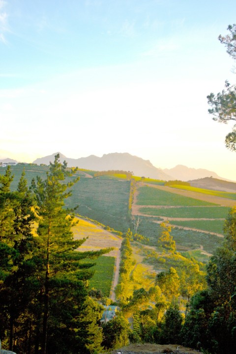 a scenic view of a mountain range at sunset nrHms