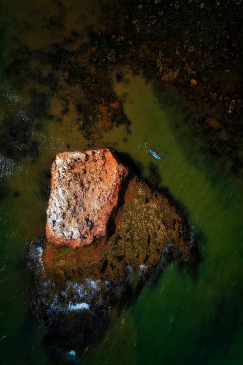 a rock in the water