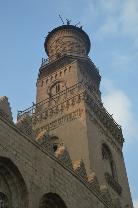 a large stone building with a tower