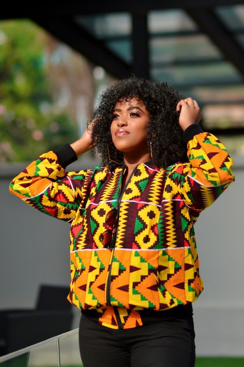 woman in yellow and red floral long sleeve shirt