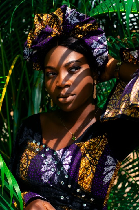 a woman wearing a colorful hat Ca