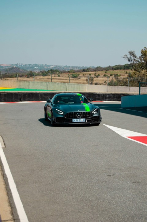 a black sports car on a race track