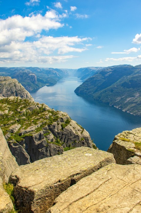 a view of a lake from the top of a mountain