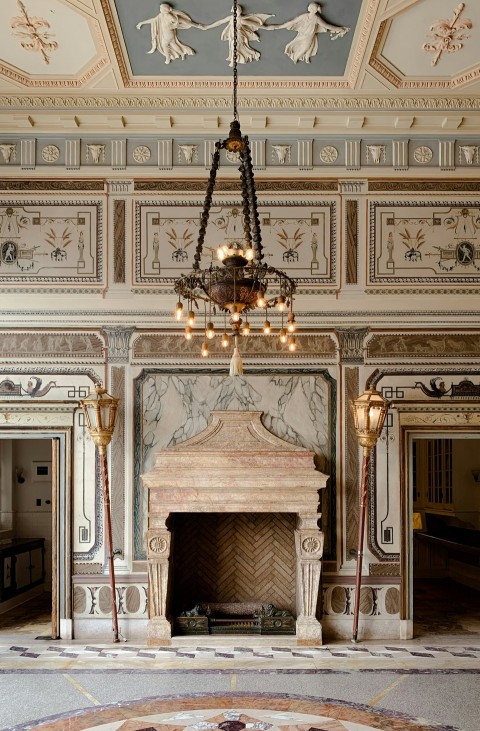 a chandelier hanging from a ceiling in a room